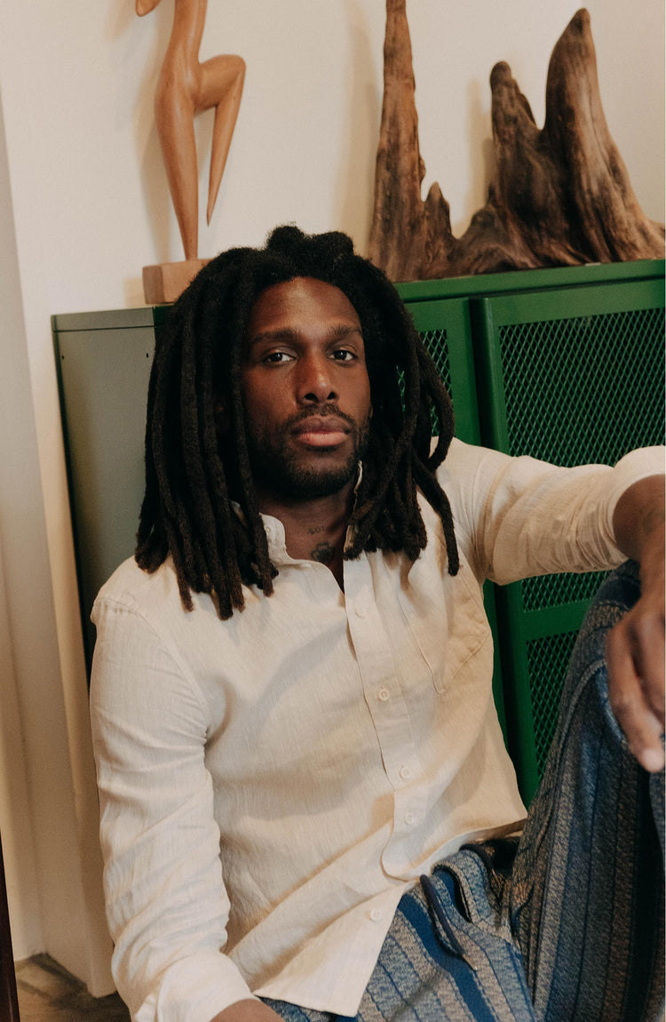 fit model sitting wearing The Jack in Flax Linen
